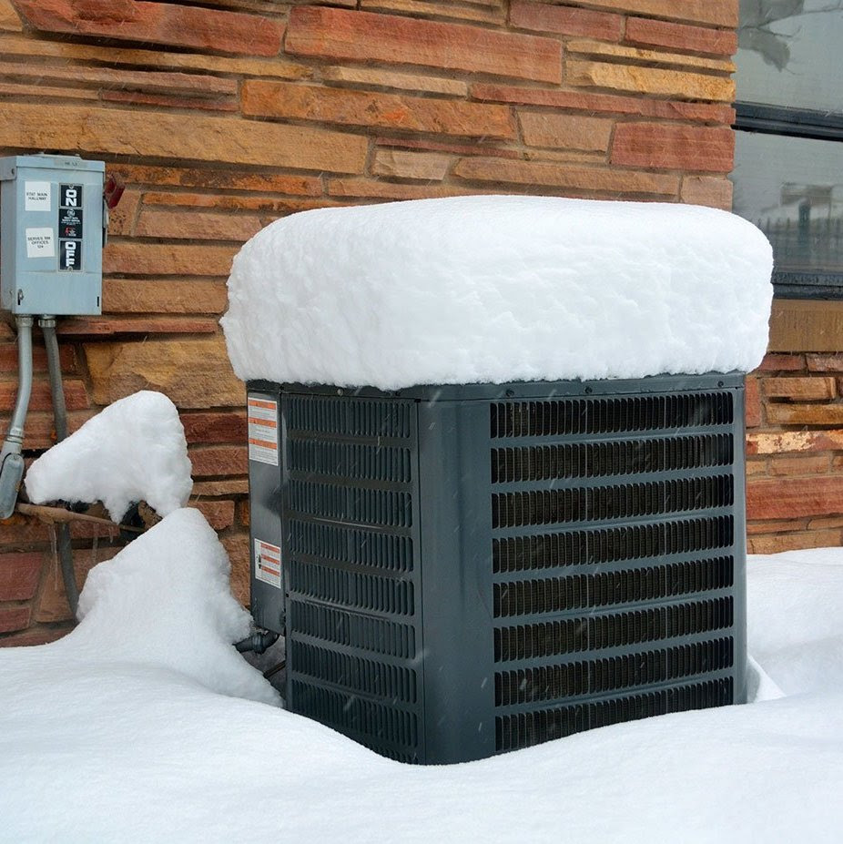 Here's an image of an HVAC unit buried in snow.